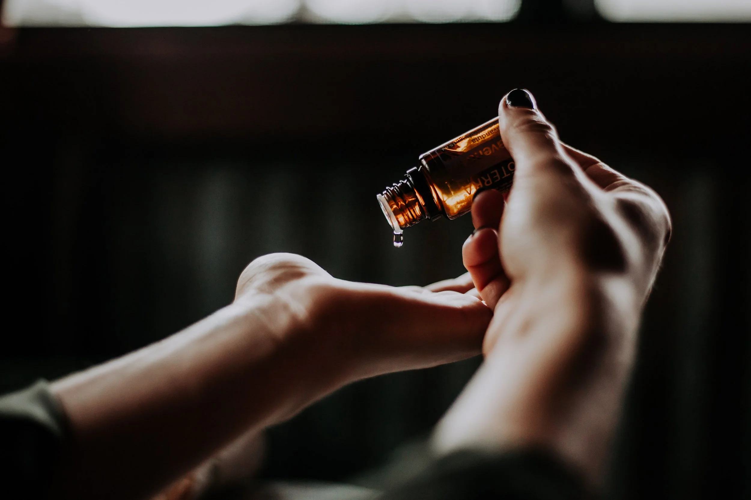 Therapeutic oil prepared by hand at the start of a session