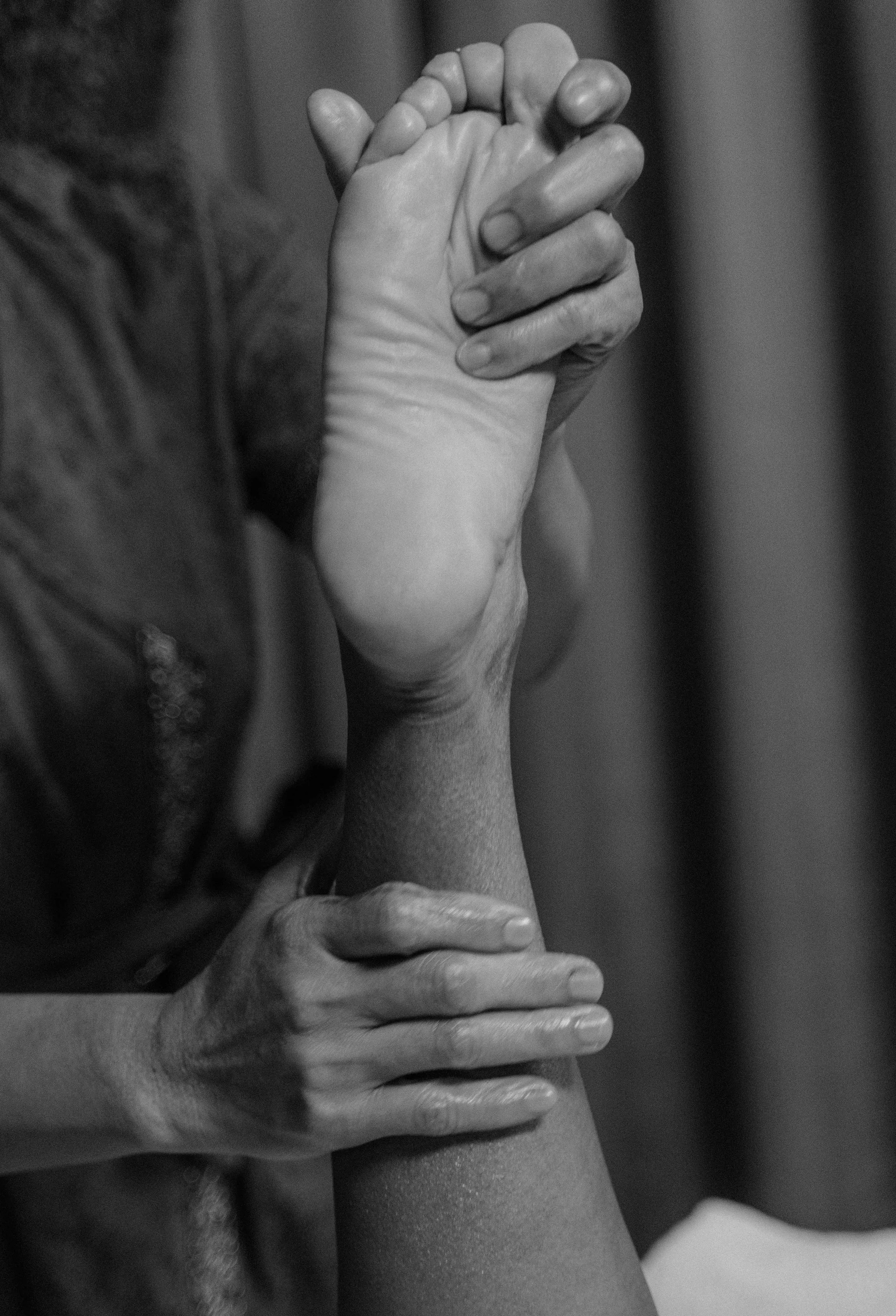 Diane working hands-on through a reflexology and bodywork session in her Fort Collins studio